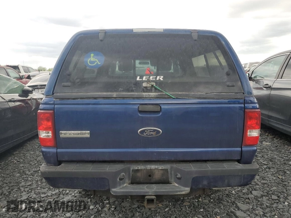 2010 Ford Ranger XLT with VIN 1FTKR4EE4APA36387, listed as a Copart auction lot 56661415 with 226,688 mi miles and Salvage title. Bid and sale history available at DreamBid. Image 6.