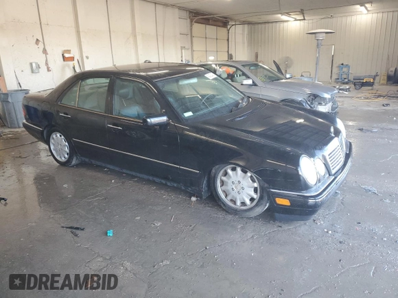 1998 Mercedes-Benz E-Class with VIN WDBJF65F2WA518941, listed as a Copart auction lot 42422425 with 153,131 mi miles and Salvage Title. Bid and sale history available at carsss.com. Image 4.