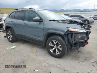 2015 Jeep Cherokee Trailhawk с VIN 1C4PJMBSXFW555223, выставлен на аукционе Copart как лот 62072235 с пробегом 207 240 миль миль и На запчасти • Non repairable. История ставок и продаж доступна на DreamBid. Изображение 4.