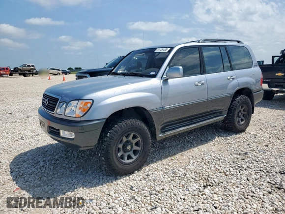 2001 Lexus LX 470 z VIN JTJHT00W313504330, wystawiony jako Copart lot #61126435 z przebiegiem 87 049 mil mil oraz Czysty tytuł • Clean title. Historia ofert i sprzedaży dostępna na DreamBid. Obrazek 1.