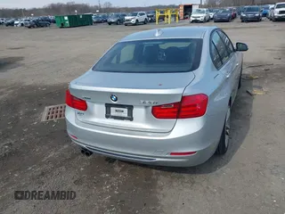 2014 BMW 3 Series 328i xDrive with VIN WBA3B3C58EJ980379, listed as a IAAI auction lot 41678676 with 183,278 mi miles. Bid and sale history available at carsss.com. Image 16.