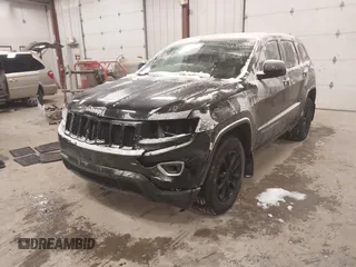 2016 Jeep Grand Cherokee Laredo with VIN 1C4RJFAGXGC311561, listed as a IAAI auction lot 41364024 with 134,042 mi miles. Bid and sale history available at carsss.com. Image 6.