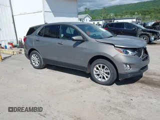 2018 Chevrolet Equinox LT z VIN 3GNAXSEV7JS599254, wystawiony jako IAAI lot #42294990 z przebiegiem 128 244 mil mil oraz . Historia ofert i sprzedaży dostępna na DreamBid. Obrazek 1.