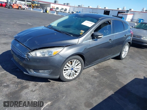 2017 Ford Focus Titanium with VIN 1FADP3N25HL299817, listed as a IAAI auction lot 42161440 with 154,974 mi miles and . Bid and sale history available at carsss.com. Image 18.