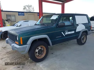 2000 Jeep Cherokee SE z VIN 1J4FT27P0YL185249, wystawiony jako IAAI lot #42650722 z przebiegiem 129 092 mil mil oraz . Historia ofert i sprzedaży dostępna na DreamBid. Obrazek 2.