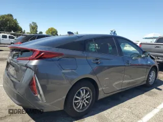 2021 Toyota Prius LE with VIN JTDKAMFP5M3177018, listed as a Copart auction lot 63930405 with 58,439 mi miles and Salvage title. Bid and sale history available at DreamBid. Image 3.