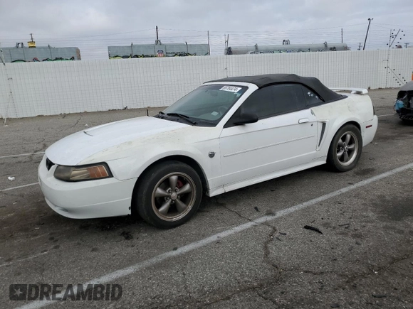 2004 Ford Mustang Deluxe z VIN 1FAFP44454F123067, wystawiony jako Copart lot #86784474 z przebiegiem 161 541 mil mil oraz Szkoda całkowita • Salvage title. Historia ofert i sprzedaży dostępna na DreamBid. Obrazek 1.