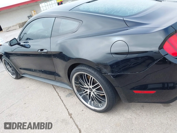 2016 Ford Mustang V6 z VIN 1FA6P8AM3G5256187, wystawiony jako IAAI lot #42415645 z przebiegiem 141 235 mil mil oraz . Historia ofert i sprzedaży dostępna na DreamBid. Obrazek 14.