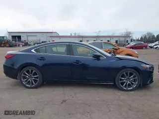 2016 Mazda Mazda6 i Grand Touring with VIN JM1GJ1W57G1486962, listed as a IAAI auction lot 41813471 with 64,078 mi miles. Bid and sale history available at carsss.com. Image 13.