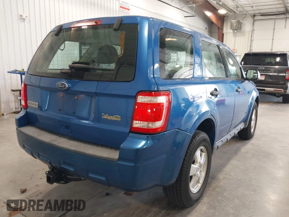 2011 Ford Escape XLS z VIN 1FMCU9C72BKB65226, wystawiony jako IAAI lot #42694360 z przebiegiem 169 375 mil mil oraz . Historia ofert i sprzedaży dostępna na DreamBid. Obrazek 4.