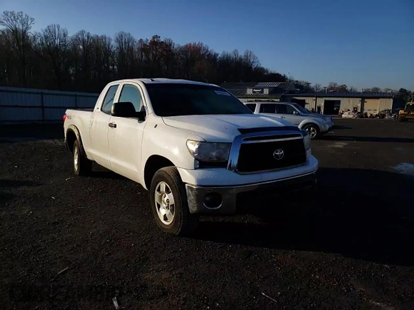 2012 Toyota Tundra z VIN 5TFUM5F13CX029961, wystawiony jako Copart lot #81052414 z przebiegiem Nie podano mil oraz Szkoda całkowita • Salvage title. Historia ofert i sprzedaży dostępna na DreamBid. Obrazek 11.