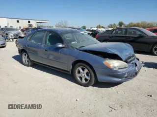 2000 Ford Taurus SE with VIN 1FAFP53U3YG259124, listed as a Copart auction lot 77363344 with 154,889 mi miles and Salvage Title. Bid and sale history available at DreamBid. Image 4.