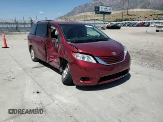 2015 Toyota Sienna LE AAS with VIN 5TDKK3DC2FS604910, listed as a Copart auction lot 59231605 with 118,974 mi miles and Salvage title. Bid and sale history available at DreamBid. Image 15.