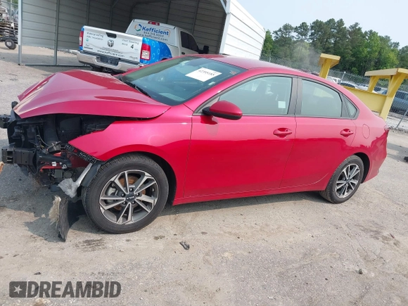 2023 Kia Forte LXS z VIN 3KPF24AD2PE590555, wystawiony jako IAAI lot #42395185 z przebiegiem 57 678 mil mil oraz . Historia ofert i sprzedaży dostępna na DreamBid. Obrazek 14.