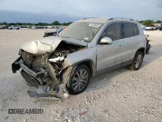 2012 Volkswagen Tiguan SEL with VIN WVGAV7AX2CW529098, listed as a Copart auction lot 53349565 with 128,603 mi miles and Salvage Title. Bid and sale history available at DreamBid. Image 1.