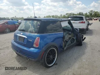 2006 MINI Hardtop with VIN WMWRC33566TK15023, listed as a Copart auction lot 76392014 with Not provided miles and Salvage title. Bid and sale history available at DreamBid. Image 3.