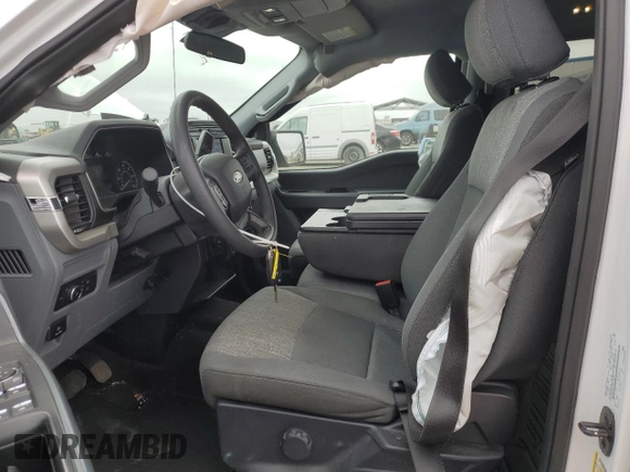 2021 Ford F-150 XL z VIN 1FTEW1CP5MKD10061, wystawiony jako Copart lot #50598155 z przebiegiem 70 055 mil mil oraz Szkoda całkowita • Salvage title. Historia ofert i sprzedaży dostępna na DreamBid. Obrazek 7.