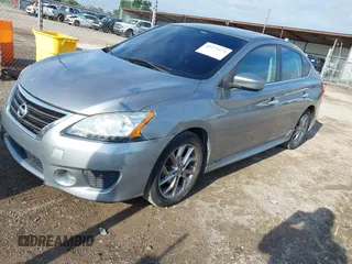 2013 Nissan Sentra SR z VIN 3N1AB7AP1DL673684, wystawiony jako IAAI lot #42372173 z przebiegiem 165 927 mil mil oraz . Historia ofert i sprzedaży dostępna na DreamBid. Obrazek 2.