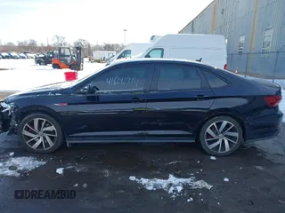2019 Volkswagen Jetta GLI S z VIN 3VW6T7BU5KM240619, wystawiony jako IAAI lot #41606714 z przebiegiem 86 557 mil mil oraz . Historia ofert i sprzedaży dostępna na DreamBid. Obrazek 14.