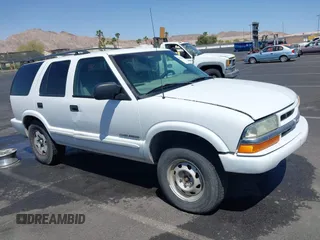 2004 Chevrolet Blazer LS z VIN 1GNDT13XX4K139559, wystawiony jako IAAI lot #42126705 z przebiegiem 197 460 mil mil oraz . Historia ofert i sprzedaży dostępna na DreamBid. Obrazek 13.
