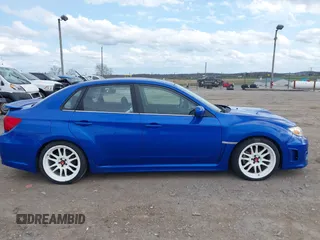 2012 Subaru WRX WRX z VIN JF1GV7E65CG017853, wystawiony jako IAAI lot #41915526 z przebiegiem 93 268 mil mil oraz . Historia ofert i sprzedaży dostępna na DreamBid. Obrazek 13.