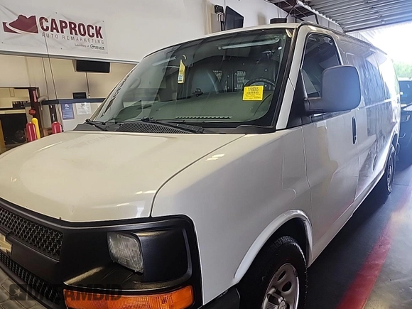 2014 Chevrolet Express Cargo Van with VIN 1GCSGAFX3E1159546, listed as a IAAI auction lot 42192001 with 286,288 mi miles. Bid and sale history available at carsss.com. Image 1.