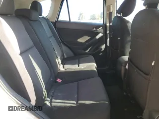 2013 Mazda CX-5 Sport with VIN JM3KE2BE7D0148951, listed as a Copart auction lot 57782115 with 65,677 mi miles and Salvage title. Bid and sale history available at DreamBid. Image 10.