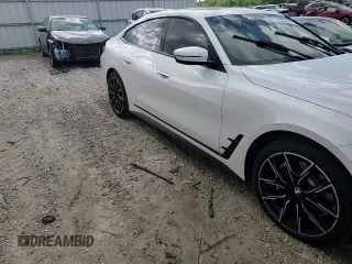 2023 BMW 4 Series 430i xDrive z VIN WBA73AV08PFM91846, wystawiony jako Copart lot #55291695 z przebiegiem Nie podano mil oraz Szkoda całkowita • Salvage title. Historia ofert i sprzedaży dostępna na DreamBid. Obrazek 13.