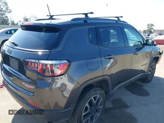 2019 Jeep Compass Trailhawk with VIN 3C4NJDDB3KT759849, listed as a IAAI auction lot 42141467 with 100,915 mi miles and . Bid and sale history available at DreamBid. Image 4.
