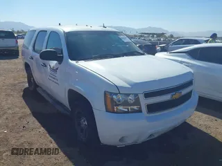 2009 Chevrolet Tahoe Police z VIN 1GNEC03039R279761, wystawiony jako IAAI lot #41530966 z przebiegiem 228 947 mil mil oraz . Historia ofert i sprzedaży dostępna na DreamBid. Obrazek 1.
