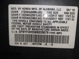 2011 Honda Pilot EX-L with VIN 5FNYF4H55BB039079, listed as a IAAI auction lot 42029278 with 173,216 mi miles. Bid and sale history available at carsss.com. Image 9.