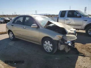 2009 Kia Spectra LX z VIN KNAFE222995667202, wystawiony jako Copart lot #49860315 z przebiegiem 158 498 mil mil oraz Szkoda całkowita • Salvage title. Historia ofert i sprzedaży dostępna na DreamBid. Obrazek 4.