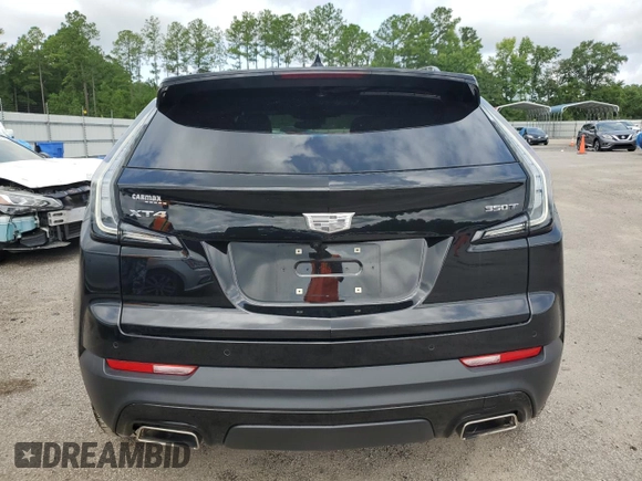 2021 Cadillac XT4 FWD Sport with VIN 1GYFZER42MF024204, listed as a Copart auction lot 63955904 with 31,262 mi miles and Salvage Title. Bid and sale history available at DreamBid. Image 6.