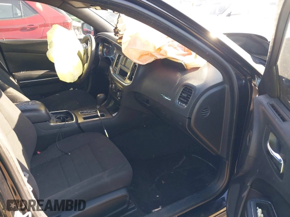 2012 Dodge Charger SE with VIN 2C3CDXBG7CH259867, listed as a IAAI auction lot 42046084 with 240,558 mi miles and . Bid and sale history available at DreamBid. Image 5.