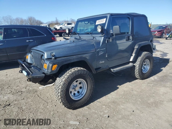 2002 Jeep Wrangler Sport with VIN 1J4FA49S22P703610, listed as a Copart auction lot 50900605 with 70,045 mi miles and Salvage Title. Bid and sale history available at carsss.com. Image 1.