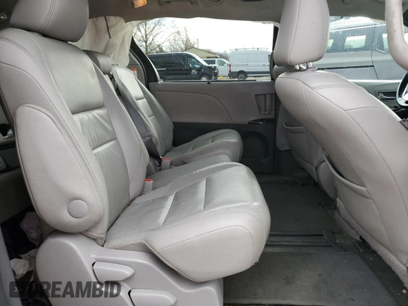 2015 Toyota Sienna XLE with VIN 5TDYK3DC4FS643475, listed as a Copart auction lot 52697405 with 153,808 mi miles and Salvage Title. Bid and sale history available at DreamBid. Image 11.