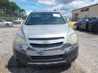 2014 Chevrolet Captiva Sport LS z VIN 3GNAL2EK1ES619408, wystawiony jako IAAI lot #42353917 z przebiegiem 166 746 mil mil oraz . Historia ofert i sprzedaży dostępna na DreamBid. Obrazek 6.
