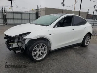 2020 Tesla Model Y Long Range with VIN 5YJYGDEE5LF053938, listed as a Copart auction lot 43381985 with 69,291 mi miles and Salvage Title. Bid and sale history available at DreamBid. Image 1.