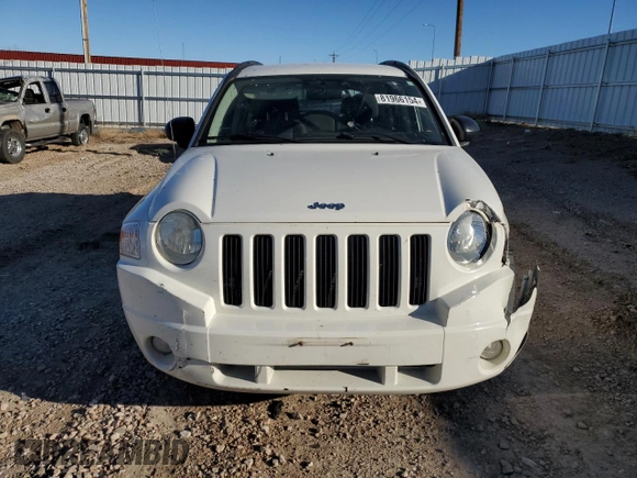 2010 Jeep Compass Sport with VIN 1J4NF4FB7AD503727, listed as a Copart auction lot 81966154 with 134,696 mi miles and Clean Title. Bid and sale history available at carsss.com. Image 5.