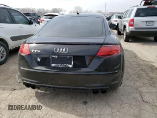 2017 Audi TTS z VIN TRUC1AFV7H1006179, wystawiony jako Copart lot #44790463 z przebiegiem Nie podano mil oraz . Historia ofert i sprzedaży dostępna na DreamBid. Obrazek 6.