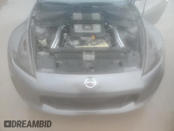 2015 Nissan 370Z Nismo z VIN JN1AZ4EH0FM444256, wystawiony jako Copart lot #54620065 z przebiegiem 78 626 mil mil oraz Szkoda całkowita • Salvage title. Historia ofert i sprzedaży dostępna na DreamBid. Obrazek 11.