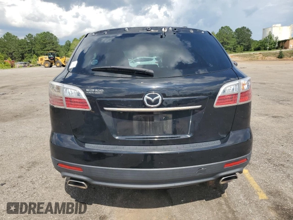 2012 Mazda CX-9 Grand Touring z VIN JM3TB2DAXC0358272, wystawiony jako Copart lot #60703665 z przebiegiem 278 558 mil mil oraz Szkoda całkowita • Salvage title. Historia ofert i sprzedaży dostępna na DreamBid. Obrazek 6.