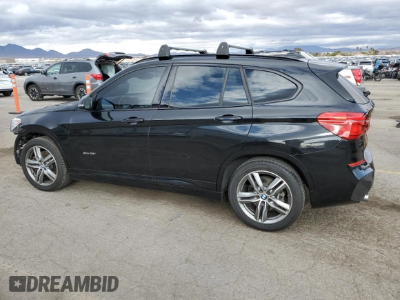 2016 BMW X1 xDrive28i with VIN WBXHT3C36G5E53172, listed as a Copart auction lot 48594805 with 69,038 mi miles and Salvage Title. Bid and sale history available at carsss.com. Image 2.