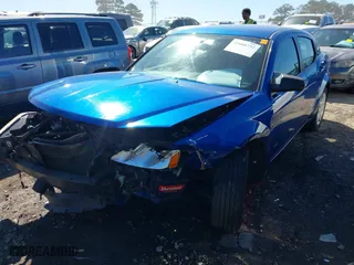 2013 Dodge Avenger SE with VIN 1C3CDZAB9DN594073, listed as a IAAI auction lot 41666732 with 228,378 mi miles. Bid and sale history available at carsss.com. Image 17.
