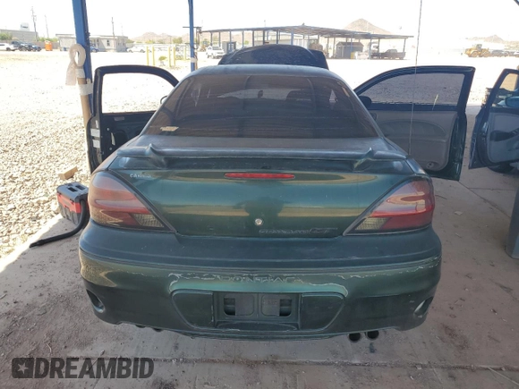 2003 Pontiac Grand Am GT z VIN 1G2NW12E73C151041, wystawiony jako Copart lot #58393835 z przebiegiem 106 052 mil mil oraz Szkoda całkowita • Salvage title. Historia ofert i sprzedaży dostępna na DreamBid. Obrazek 6.
