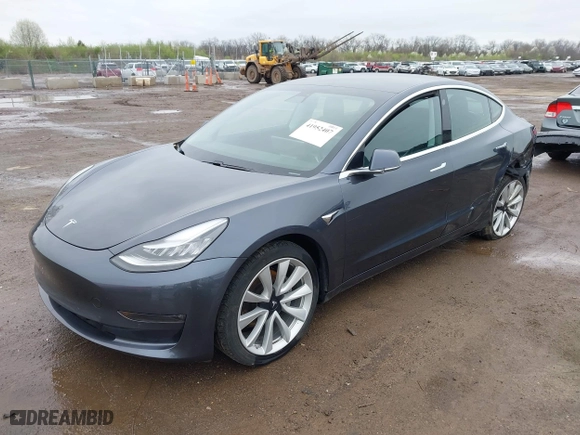 2019 Tesla Model 3 Long Range with VIN 5YJ3E1EB3KF469294, listed as a IAAI auction lot 41952407 with 51,711 mi miles. Bid and sale history available at carsss.com. Image 19.