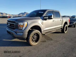 2022 Ford F-150 XL with VIN 1FTFW1E89NFA14920, listed as a Copart auction lot 76790934 with 64,991 mi miles and Salvage Title. Bid and sale history available at DreamBid. Image 1.