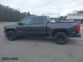 2015 Chevrolet Silverado 1500 LT with VIN 3GCUKREC9FG519510, listed as a IAAI auction lot 42026865 with 119,510 mi miles. Bid and sale history available at carsss.com. Image 14.