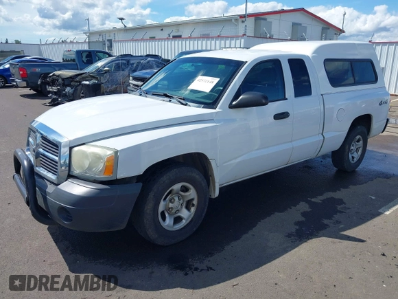 2005 Dodge Dakota ST with VIN 1D7HW22K15S119947, listed as a IAAI auction lot 42372148 with 140,528 mi miles and . Bid and sale history available at DreamBid. Image 2.