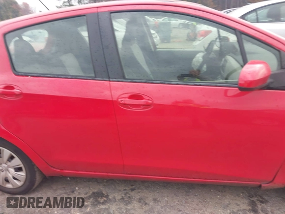 2013 Toyota Yaris L with VIN JTDKTUD32DD554425, listed as a IAAI auction lot 40961115 with 1 mi miles. Bid and sale history available at carsss.com. Image 13.